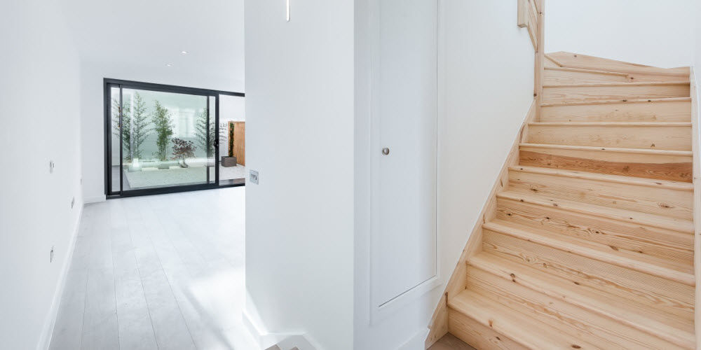 Lovely staircase design on this tight urban build